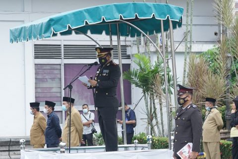 Kapolres Tebing Tinggi, AKBP Agus Sugiyarso, S.Ik saat memimpin upacara Hari Kebangkitan Nasional. Foto: Roy.