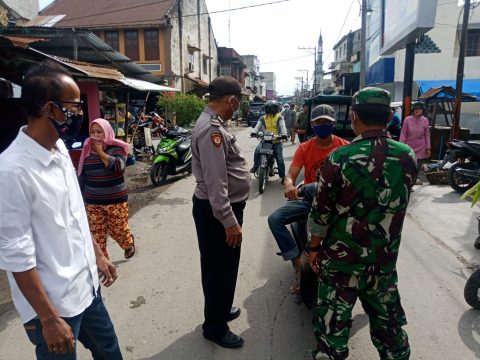 Polsek Tanjung Beringin Ajak Masyarakat Patuhi Prokes dan PPKM level 3. Foto: Humas Polres Serdang Bedagai.